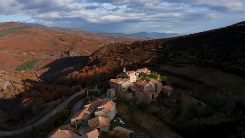 Aerial View of Mountain Village in Autumn Forest, Spanish Pyrenees