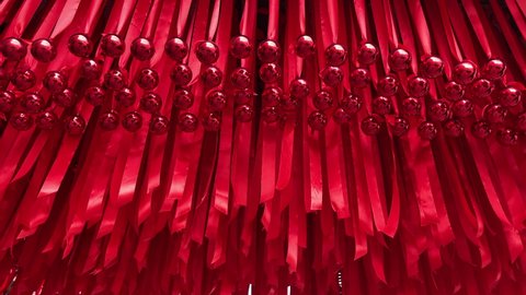 Red ribbons hang side by side awesome Design interesting different background image 4K video shoot red love Valentine's Day concept abstract pastel background images buying now.