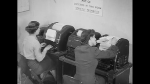 CIRCA 1944 - WACs operate teletype machines.