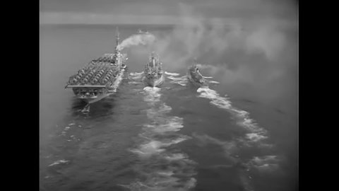 CIRCA 1954 - The USS Hornet, USS Aludra, and USS Frank Evans sail together at sea.