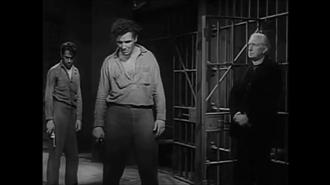 CIRCA 1932 - In this crime movie, a convict refuses to let the leader of a prison break shoot the prison priest, and another is killed by the cops.