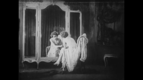 CIRCA 1925 - In this silent film, a man is furious to learn that a woman he once cared for (Greta Garbo) is now working as a prostitute.
