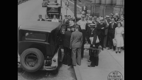 CIRCA 1931 - New York City Mayor Walker walks out of a courthouse during his trial for corruption in New York government.