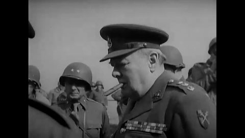 CIRCA 1945 - Prime Minister Churchill, General Montgomery and General Hobbs cross the Rhine in landing crafts.