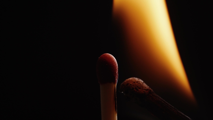 Wooden matchstick burning in darkness | Shutterstock HD Video #1086028112