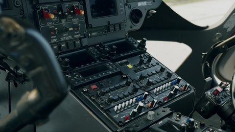 Control panel inside helicopter cockpit - dolly shot