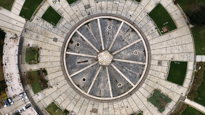 Aerial rotating Top shot of Freedom Square fountain in Bratislava, Slovakia on overcast day