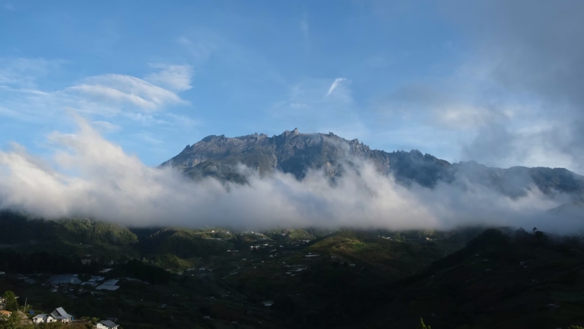 Mt Kinabalu, Mount Kinabalu view from Kundasang, Sabah, Malaysia , Mount Kinabalu timelapse with moving cloud