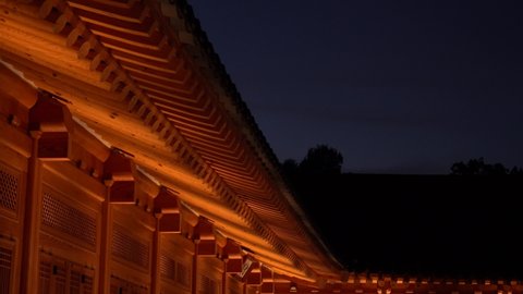 Night view of the traditional korean architecture. Traditional asia house at night and orange light or indirect lighting