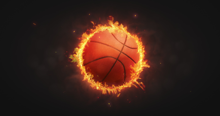  Rotating orange basketball ball in burning fire flames on dark background. Sport equipment as loopable 4K video background.