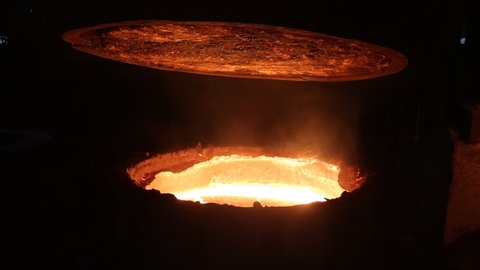Ladle with liquid metal.  Iron smelting, Steel production. Electric steel furnace. Metallurgy. Industry steel production. 