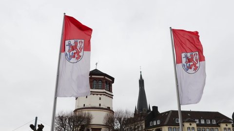 dusseldorf, nrw, germany - 21 01 2022: flags with the symbol of dusseldorf city in germany