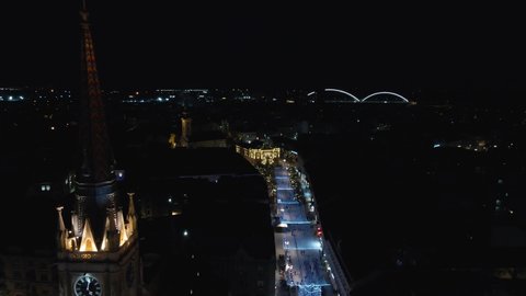 Novi Sad, Serbia night aerial drone view of the center of Novi Sad. Drone shot of Novi Sad. Aerial view of winter fest in Novi Sad.