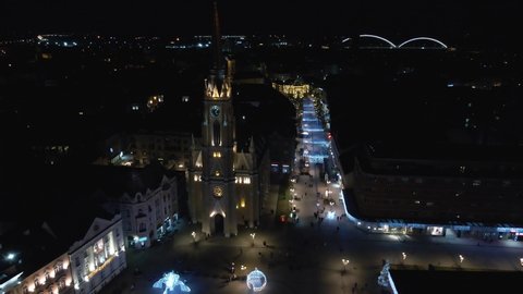 Novi Sad, Serbia night aerial drone view of the center of Novi Sad. Drone shot of Novi Sad. Aerial view of winter fest in Novi Sad.