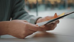 Close-up female hands holds envelopes letters correspondence receive alerts from bank account. Unrecognizable woman sitting at table checking mail holding papers documents got invitation loan approved - Powered by Shutterstock - Get 15% off with code: PIKWIZARD15