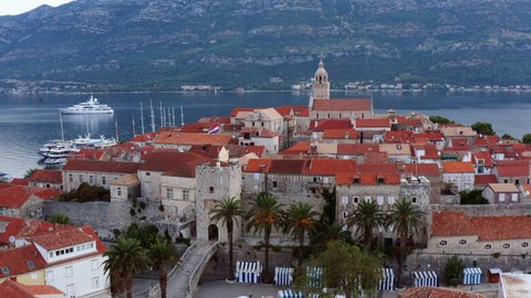 Scenic View of the Historic Town of Korcula In Summer, Island of Korcula, Dalmatia, Croatia - aerial drone shot