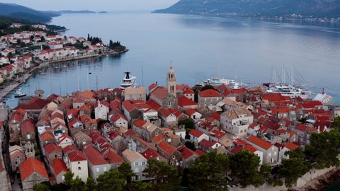 Historic Settlement Of Korcula Old Town During Early Morning In Adriatic, Croatia. Aerial Wide