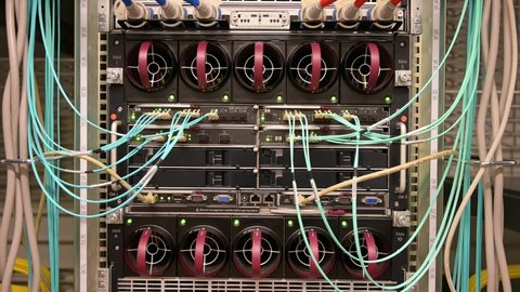 Hamburg, Germany - January 21, 2022: RJ45 network connections on a HP server blade system enclosure in a data center