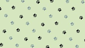 Colorful pattern of cat paws. Seamless pattern with cat paw. Top view. Dog, cat footprint background. 4K video motion