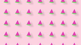 Colorful pattern of watermelon slices on pink background with shadows. Seamless pattern with watermelon slices. Top view. Summer concept. 4K video motion