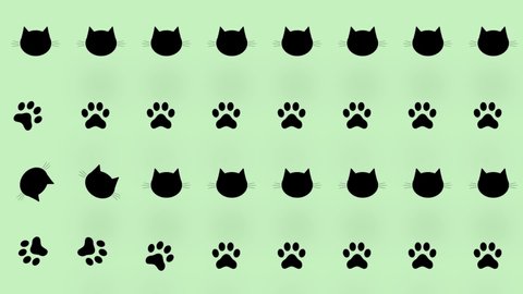 Colorful pattern of black cat heads and paws on green background. Seamless pattern with cat paw and faces. Animal silhouette. 4K video motion
