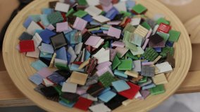 Master class on making mosaic panels. Close-up of the hands of an adult woman
 - Powered by Shutterstock - Get 15% off with code: PIKWIZARD15