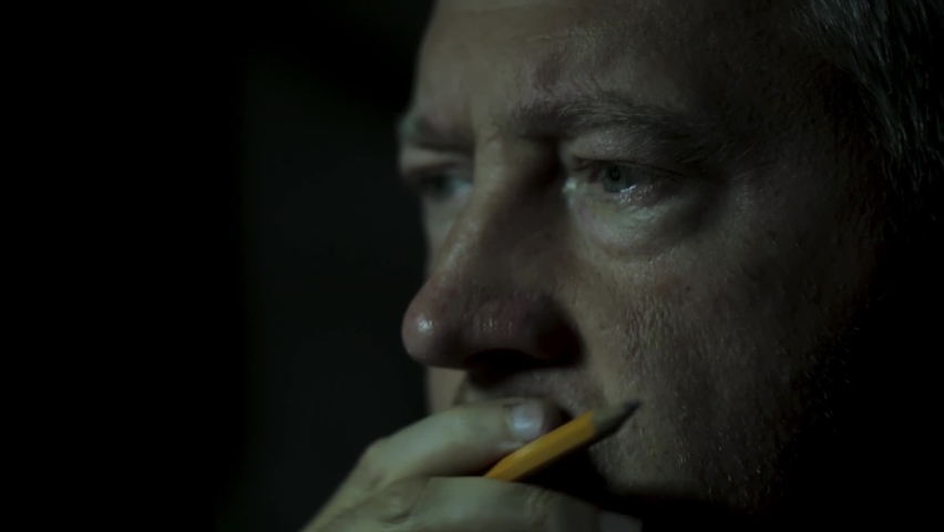Emotional man face. Fast reading from screen page.