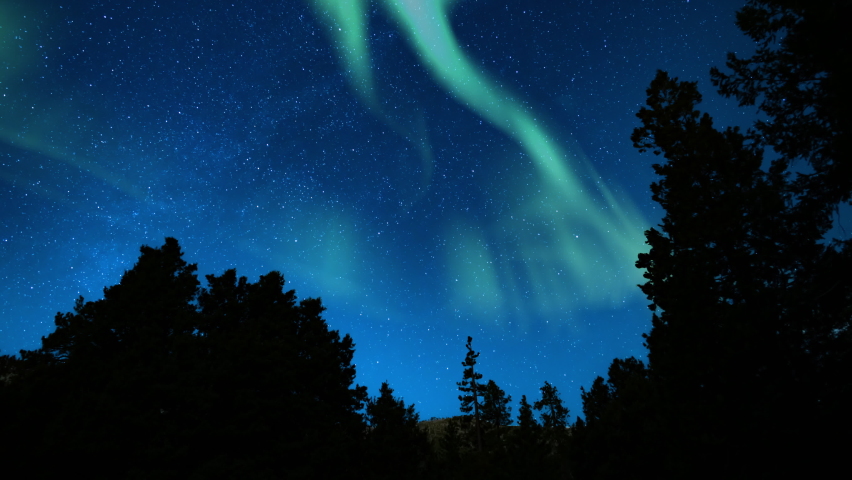 Aurora Borealis Green Loop Winter Mountain Forest Blue Sky Northern Lights | Shutterstock HD Video #1086073997