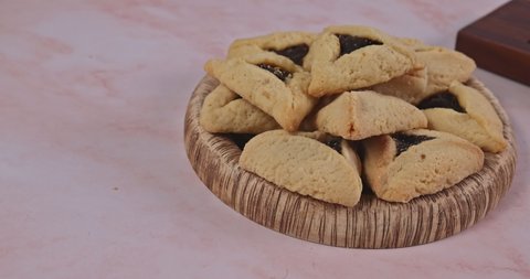Haman's ears cookies for Purim celebration Jewish holiday kosher wine carnival