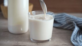Homemade fermented milk. Traditional healthy drink ryazhenka or homemade yogurt Video 4k