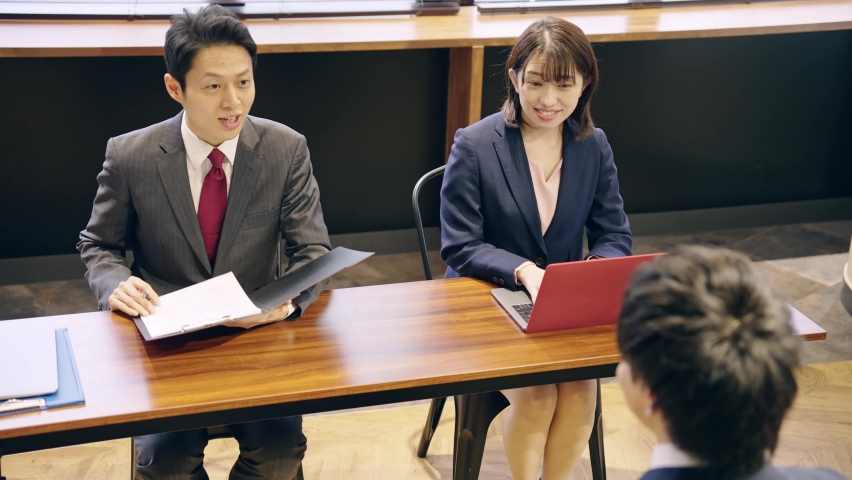 Job interview concept. Group of Asian businessperson talking in the office. Royalty-Free Stock Footage #1086098288