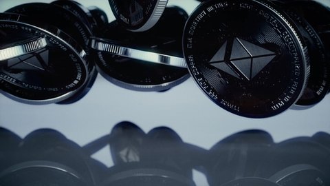 Ethereum Coin Spinning Background. 4K A Ethereum Crypto Currency coin spinning.