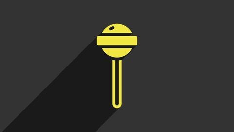 Yellow Lollipop icon isolated on grey background. Food, delicious symbol. 4K Video motion graphic animation.