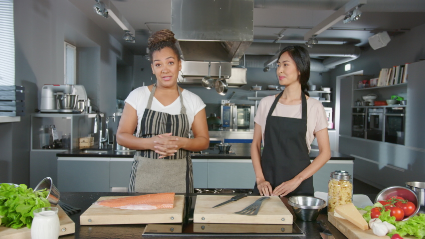 Social Media TV Cooking Show Montage in Restaurant Kitchen with Female Chefs. Two Diverse Presenters Talk, Show Step-by-Step How to Prepare Healthy Fun Meal. Online Video Course How to Make Tutorial | Shutterstock HD Video #1086104279