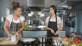 Part Eight of Social Media TV Cooking Show Montage in Restaurant Kitchen with Female Chefs. Two Diverse Presenters Talk, Show Step-by-Step How to Prepare Healthy Fun Meal. Online Video Course
