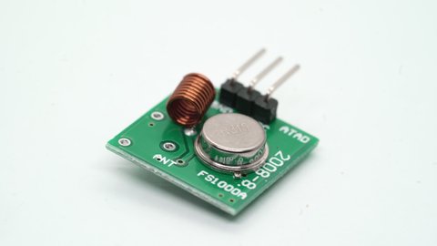 Radio transmitter and receiver electronic component with antenna. Small single board computer, device for study. Rotate at white isolated. Electronics diy robotics chip microcontroller board. Rx Tx.