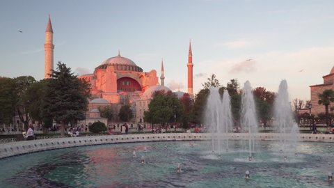 Scenic fountain at the Sultanahmet Square and the Hagia Sophia in Istanbul, Turkey. The Sultanahmet Square is a popular tourist attraction of the world.