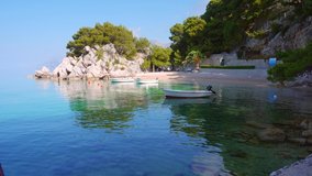 Quiet picturesque bay in the morning light. Location place Brela resort, Makarska riviera, Croatia, Dalmatia region, Balkans, Europe. Cinematic travel footage. Beauty of earth. Filmed in 4K video.