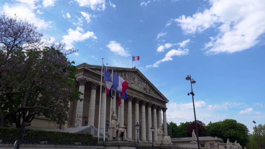 French National Assembly building with French and EU flags waving - Paris, France. | Shutterstock HD Video #1086154763