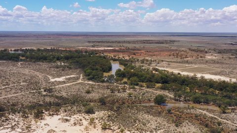 Watercourse of Darling river at Wilcannia town in Australian outback aerial 4k.
