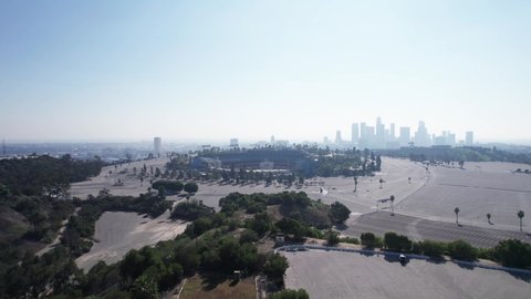 Los Angeles, 25 JAN 2022. Dodger Stadium Los Angeles California with the Downtown LA and mountains view foggy, smog, Stadium Arena, home of LA Dodgers, Baseball stadium