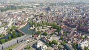 Inscription on video. Strasbourg, France. Quarter Petite France, Vauban Dam. Flames with dark fire, Aerial View