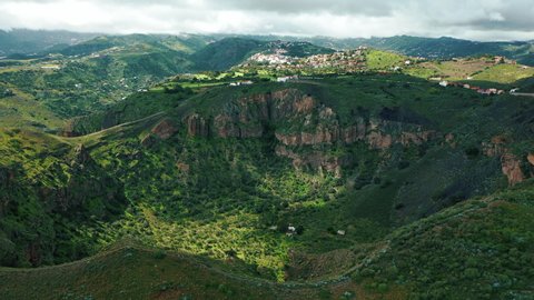 Ancient volcanic crater of Caldera de Bandama in Gran Canaria. Lush green area of natural richness was formed million of years ago along with the ancient volcano Pico de Bandama. Canary islands.