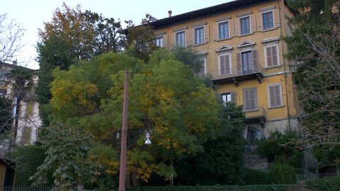 Bergamo. Lombardy. Italy. 31-10-2021. Ancient house facade in the historic center of Bergamo. Panning 4K