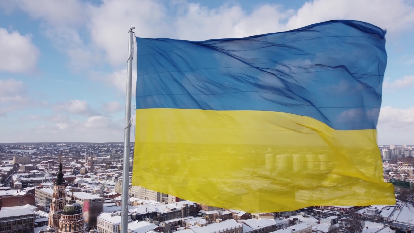 Ukrainian flag in the wind. Blue Yellow flag in the city of Kharkov	 | Shutterstock HD Video #1086182867