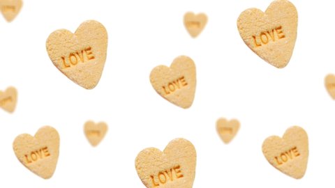 Animated Sweet hearts shaped yellow Sugar Pill flying and wigglein in the air on isolated background. Valentines day, Date, Wedding, 8 March, Womens gift. Romantic love concept. Minimal motion desig