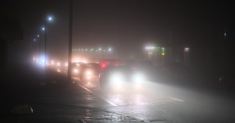 Car traffic jams due to foggy weather