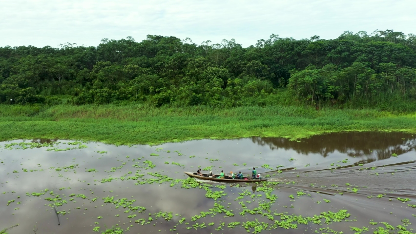 Peru Fisherman Traveling by Boat on Amazon River - Aerial
