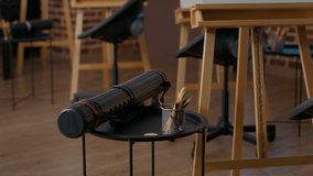 Empty art class with colorful pencils and artistic equipment on table used to draw professional masterpiece on canvas. Drawing tools and instruments to create sketch in workshop. Close up - Powered by Shutterstock - Get 15% off with code: PIKWIZARD15