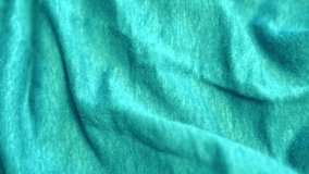 Smooth Light Blue Green Turquoise Wool Fabric Cloth Clothing, Wool Textile, Woolen Material, Warm Plaid, Macro, Closeup. Blue Green Turquoise Abstract Background. Sewing Factory.